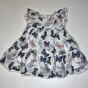 Flowy ruffle sleeveless butterfly dress